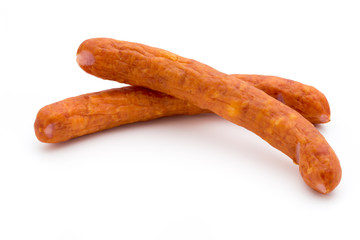 Stack of smoked sausages isolated on a white background.