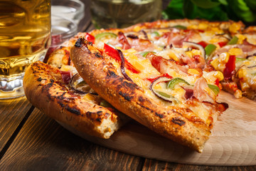 Homemade pizza with bacon, paprika and corn