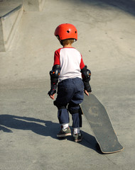 Young boy with skateboard