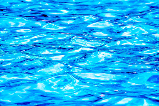 Surface of the pool water as a background