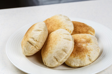 Freshly baked Arabic bread batbout