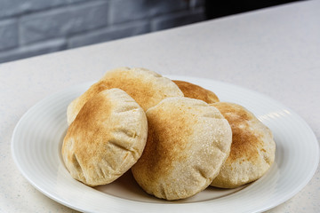 Freshly baked Arabic bread batbout