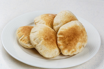 Freshly baked Arabic bread batbout
