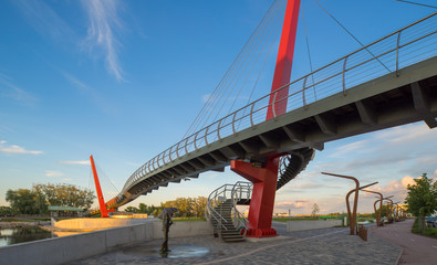 Fototapeta na wymiar Jelgava, Bridge. New pedestrian cable-stayed bridge in Jelgava.