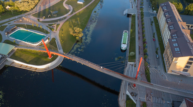 Pedestrian cable-stayed bridge in Jelgava. Aerial view from drone.