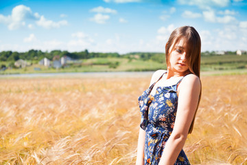 Beautiful girl in the field