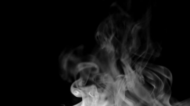 Smoke on a black background in slow motion