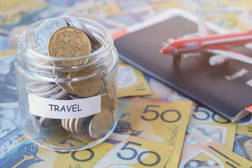 Australian money in TRAVEL jar with passport