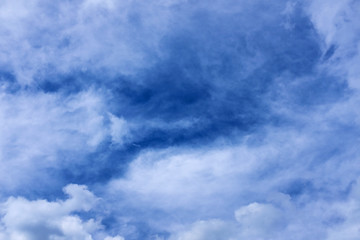 Naklejka na ściany i meble A cloudy sky on a summer day.