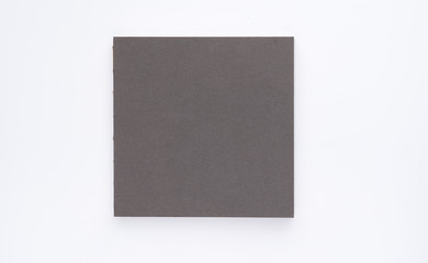 Gray square notebook on white background