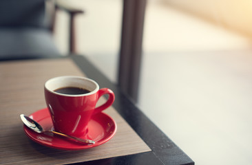 laptop and black coffe in vintage tone