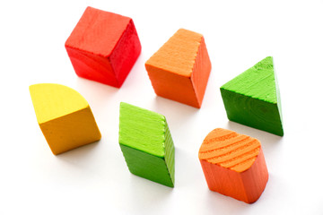 Set of wood shape toy block (square, triangle, trapezoid, oval) on white background