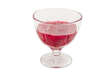 Raspberry jam in the glass dessert bowl