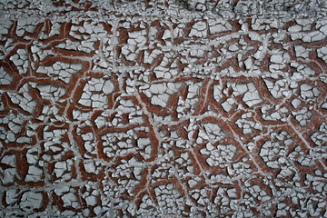 Cracked paint on metal background