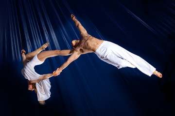Couple circus air gymnast