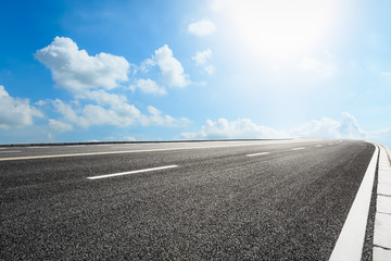 Asphalt road and blue sky