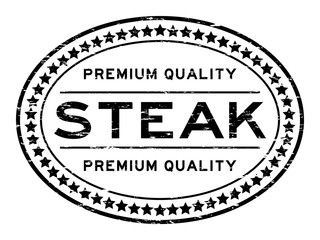 Grunge black premium quality steak oval seal stamp on white background