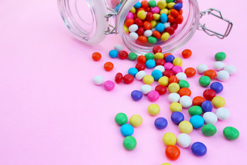 Colorful candies in a jar