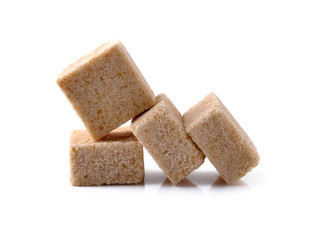 brown sugar cube isolated on white.