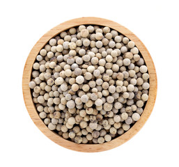 white peppers in wooden bowl on white background