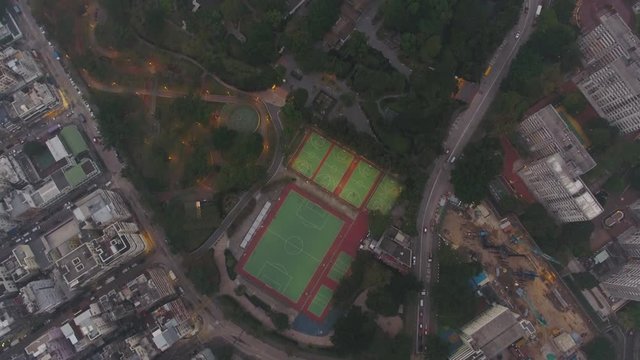 Hong Kong Aerial v62 Flying over Kowllon Walled City Park looking down vertically