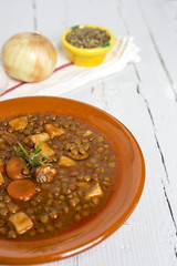 Stew of lentils with chorizo and pork