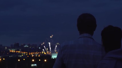 4k Romantic old Couple Silhouette Watching Fireworks Hugging Love Relationship Celebration Concept
