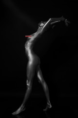 Fototapeta na wymiar naked body in a silver body painting