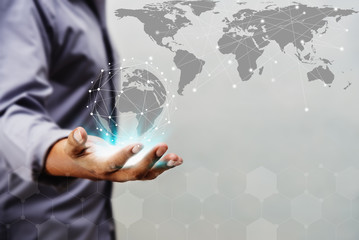 Young man hand holding a world technology circle virtual and Polygon