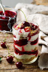 cherry cheesecake in a  jar.style rustic