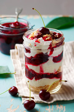 cherry cheesecake in a  jar.style rustic