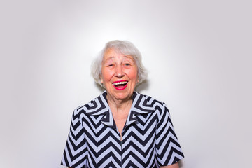 The portrait of a laughing old woman