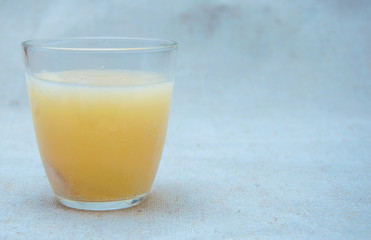 Effervescent tablet (vitamin) in a glass of water.