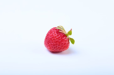 Fresh strawberry isolated on white background. Selective focus.
