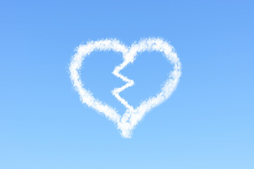 Naklejka premium Valentine concept broken heart shaped cloud and arrow with clear blue sky