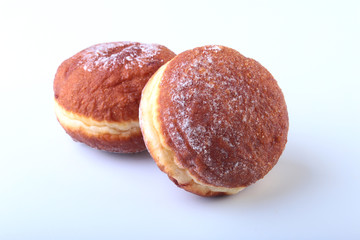 Homemade Doughnuts with Jelly filled and powdered sugar isolated on white background. Selective focus.
