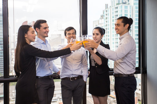 Businessman Holing Glass For Drinking With Business Discussion, Mini Party For Business .and A Group Of Person, 30-40 Year Old.