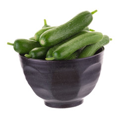 Organic Mini Baby Cucumbers isolated on white background