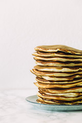 Delicious pancakes on white background. Morning and breakfast concept