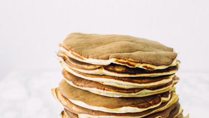 Delicious pancakes on white background. Morning and breakfast concept