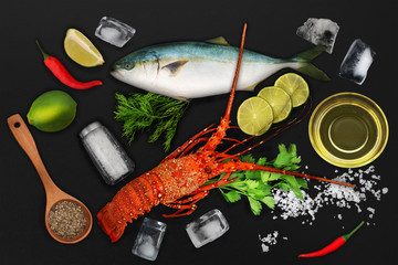 Seafood theme collage, fish and lobster with ingredients for cook