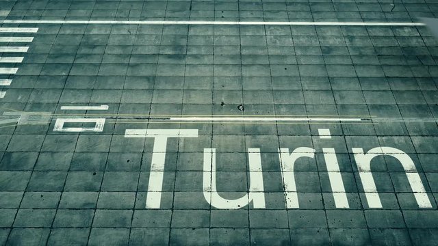 Aerial view of commercial plane landing at Turin airport. Travel to Italy conceptual 4K intro animation