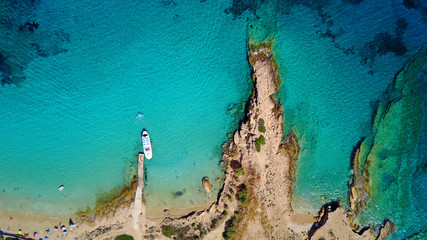 Aerial drone photo of Koufonisi island with clear turquoise waters, Cyclades, Greece