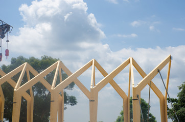  Wooden frame of commercial construction ready for roof