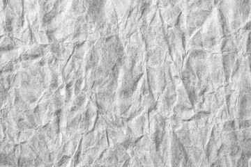 Colorless creased paper background texture