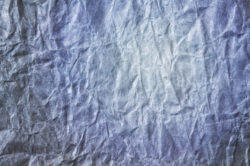 Blue crumpled paper background, texture