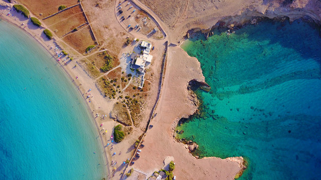 Aerial drone photo of famous caves of Ksylobatis near Pori beach, Koufonissi island. Cyclades, Greece