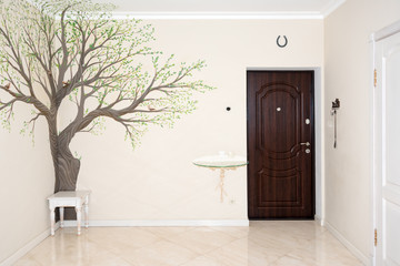 House interior. Entrance hallway with drawing on the wall.