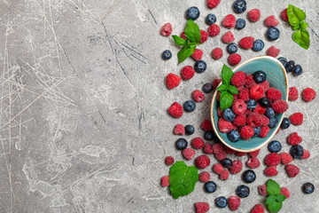 Fresh summer berries in vintage bowl 