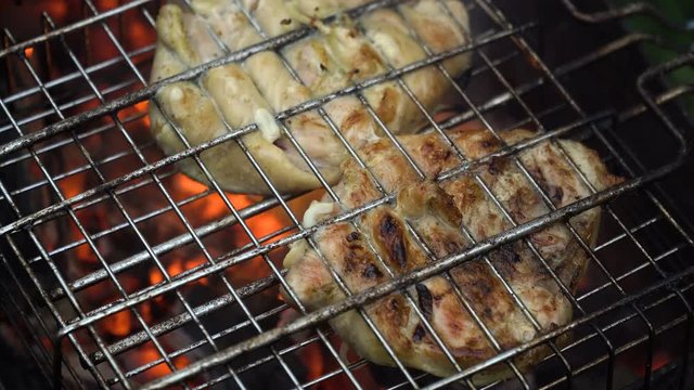 Barbecue with delicious grilled meat on the grill.Barbecue meat is fried grill grate.Grilled meats outdoors.Barbeque on the grill